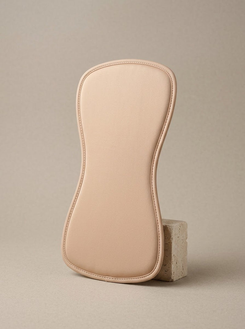 ONIFEM abdominal board, a contoured beige foam board worn under compression after a tummy tuck or liposuction